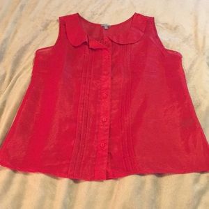 Red sleeveless top
